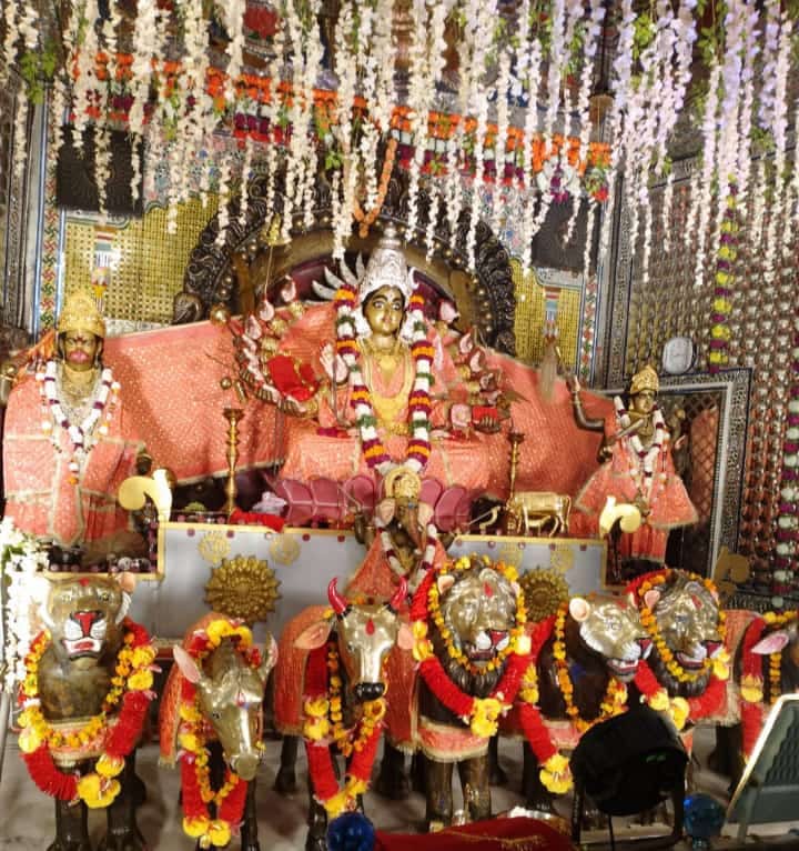 Skandamata dressed in orange