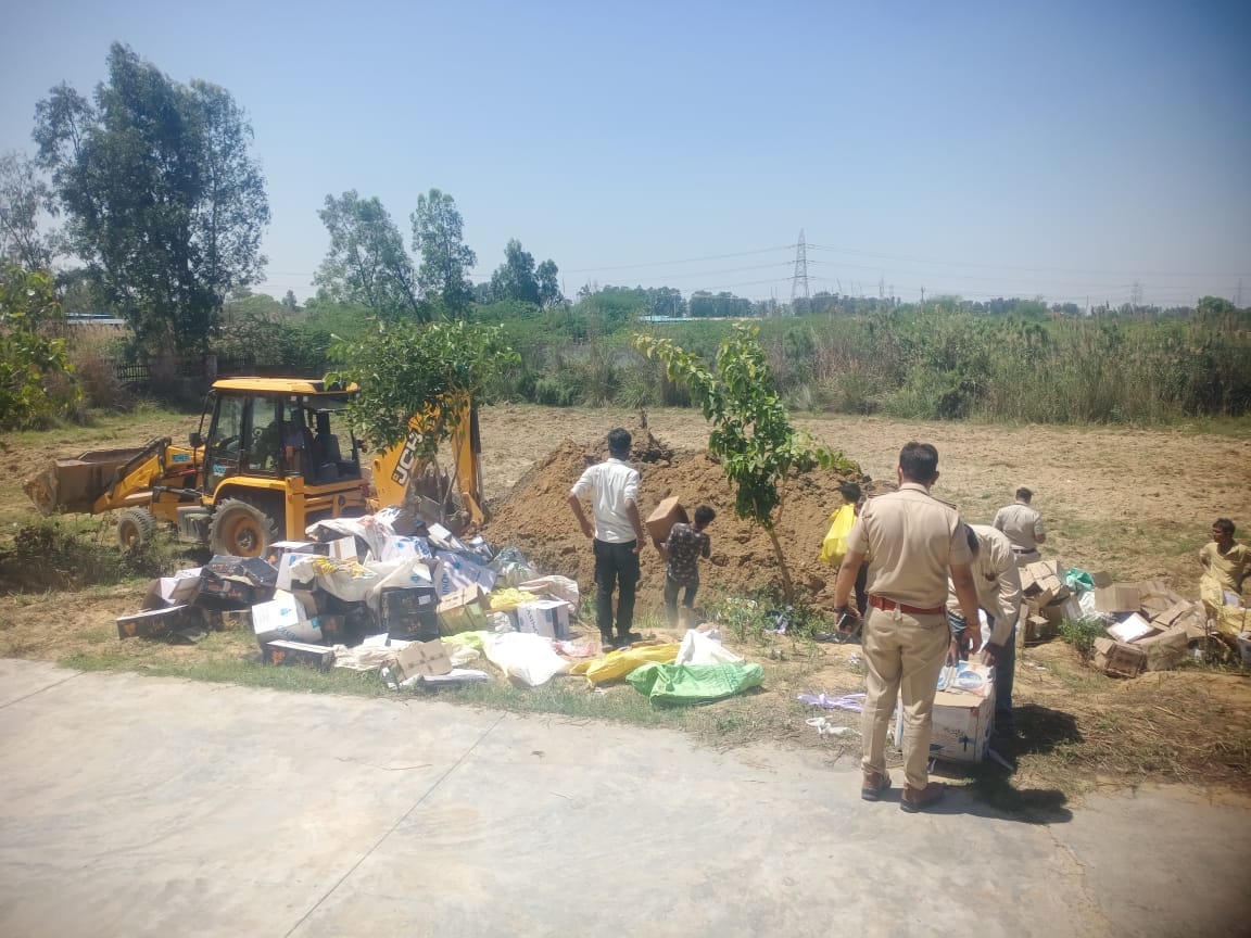 Police buried six thousand illegal liquor bottles and fireworks in the soil