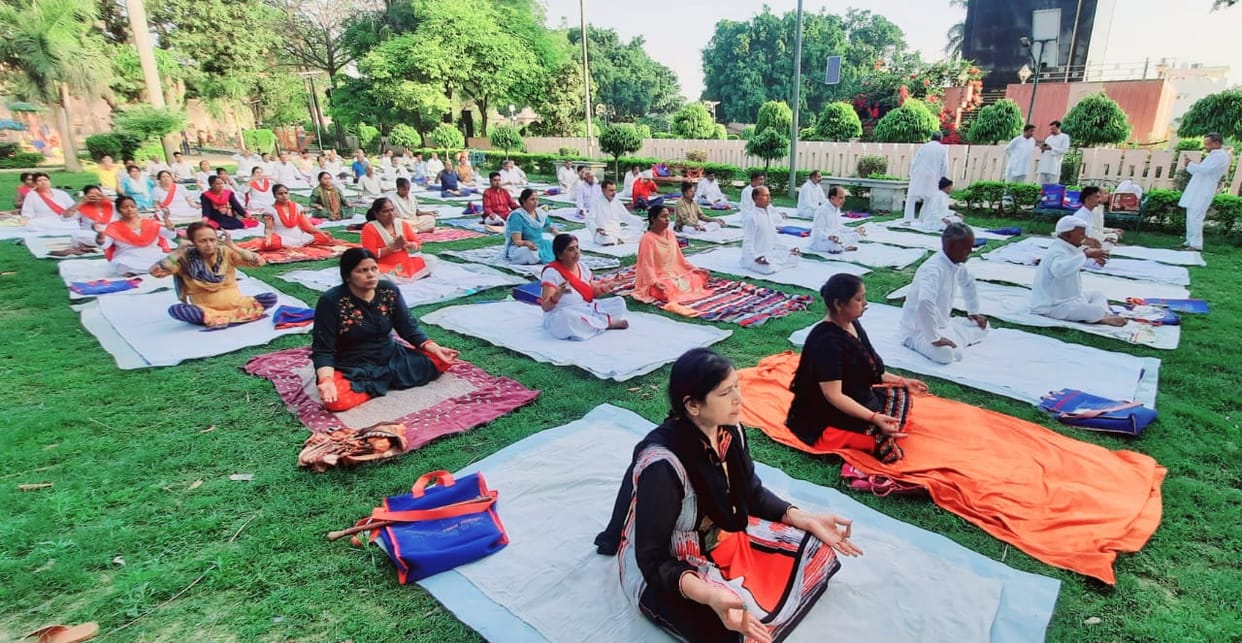 Explained the importance of staying healthy through yoga
