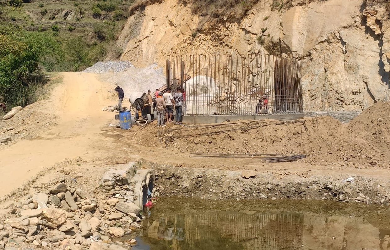 Construction of permanent bridge started on Binsar river