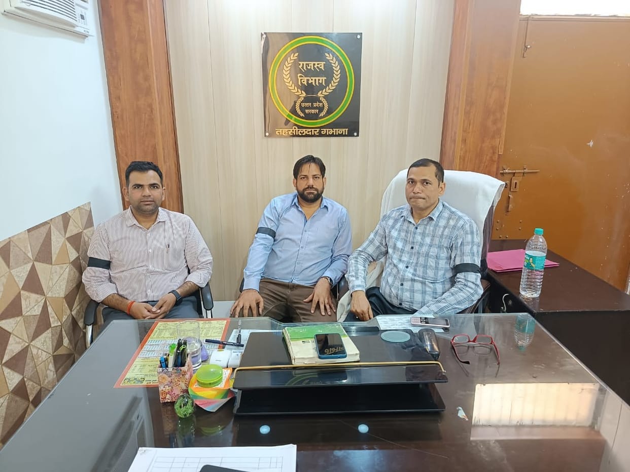 Work done by tying a black band against Tehsildar