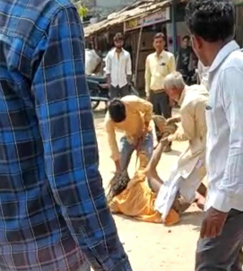 Elderly head pressed with foot and thrashed with belt video viral