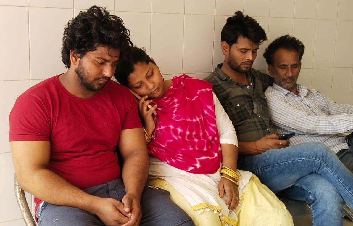 Son wandering with an application to file a case of father death