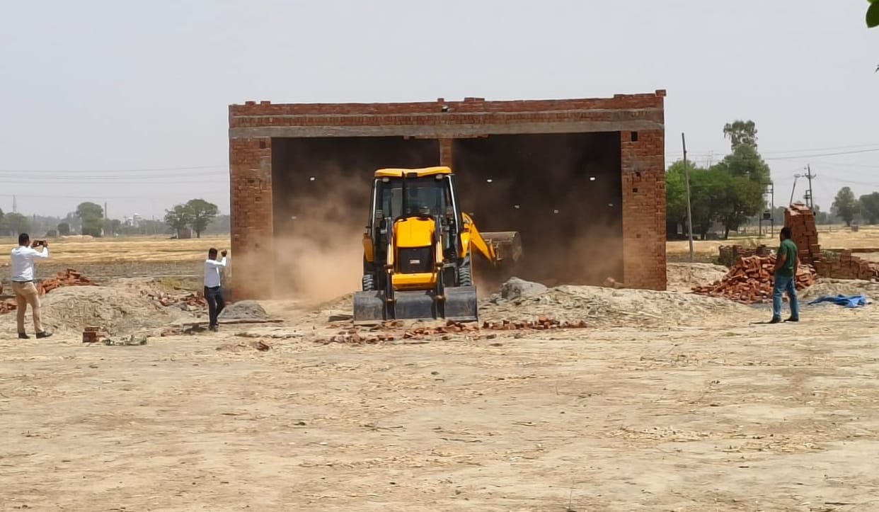District planner's team demolished shops and boundary wall without approval