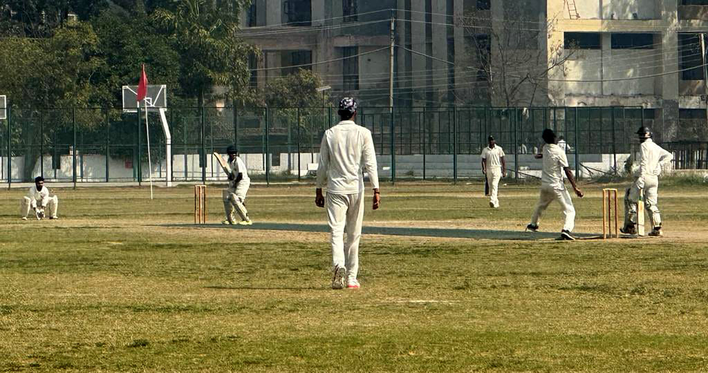 KU team defeated public university in cricket match