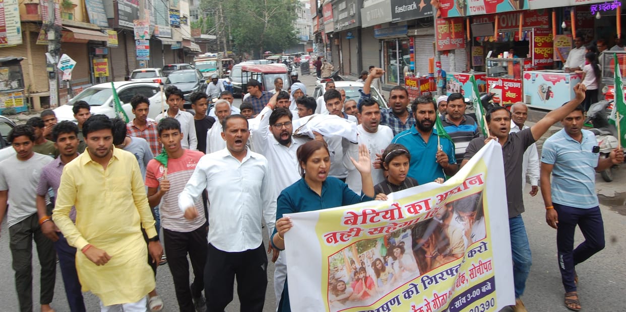 Effigies burnt in support of wrestlers