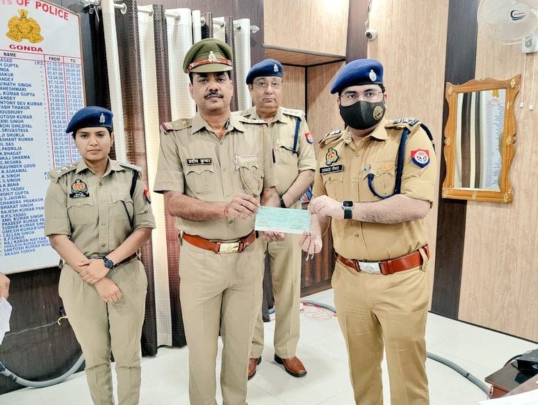 Scholarship checks received by fathers of meritorious students