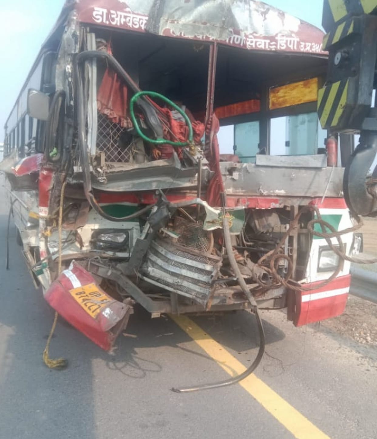 Roadways bus collided with standing truck, driver killed, 32 passengers injured