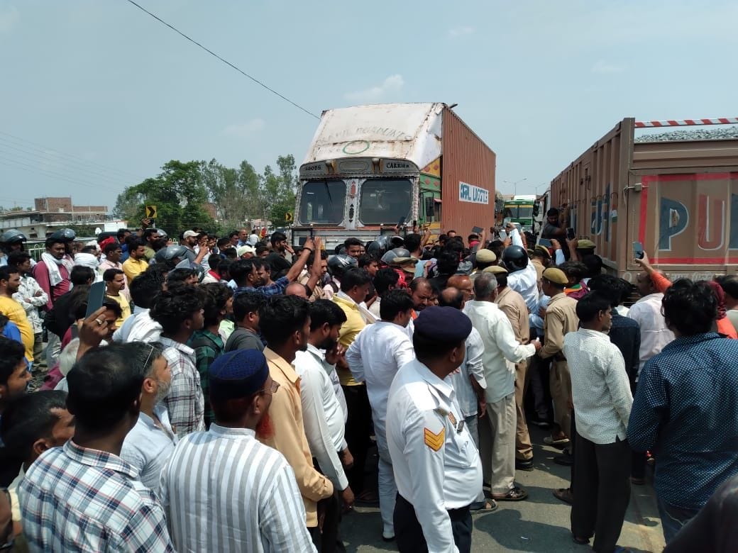 Electrician dies after being hit by truck