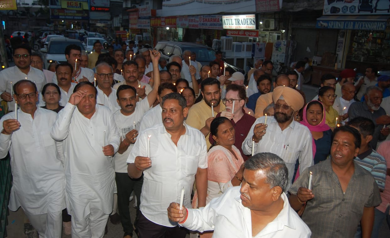 Congressmen take out candle march in support of wrestlers