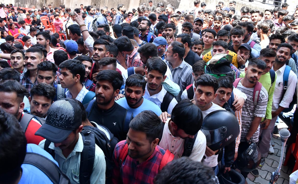 Crowd of youths gathered in the small employment fair, placement of 680 youths