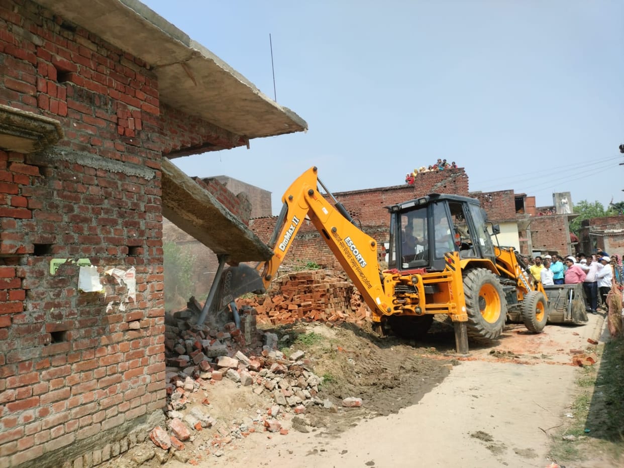 Police removed the encroachment on the barn from JCB