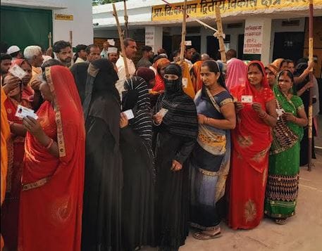 Women reached the booth in veil and mask