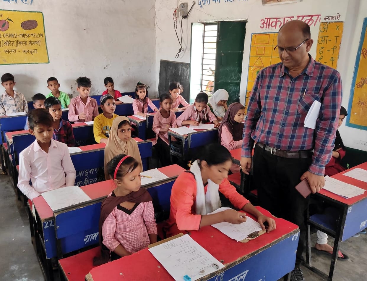98634 students gave intellectual test in 1743 schools of the district