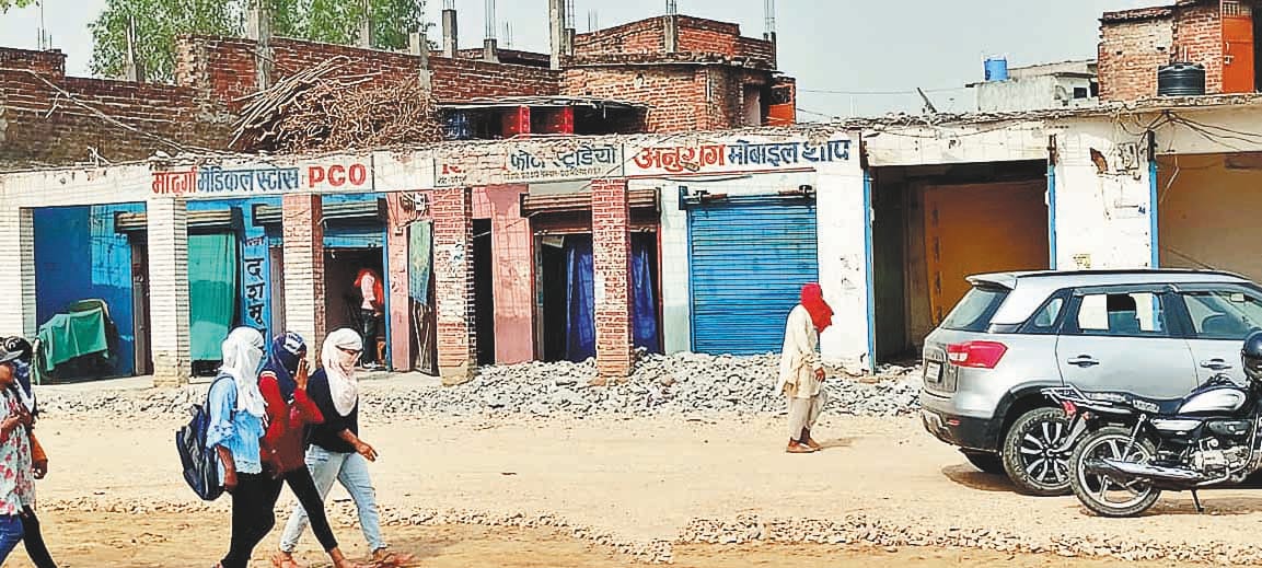 Bulldozer will run on shops and houses, road will be wide