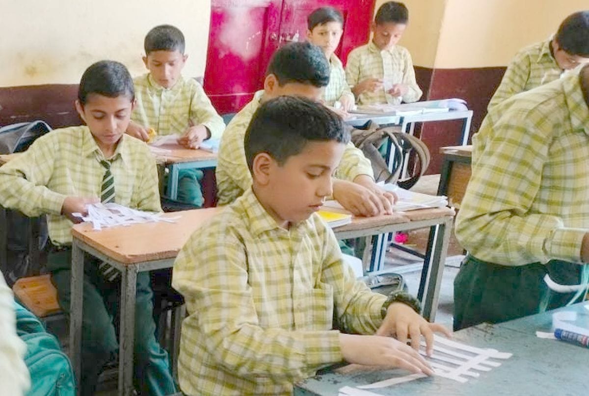 Students acquiring knowledge of science while playing