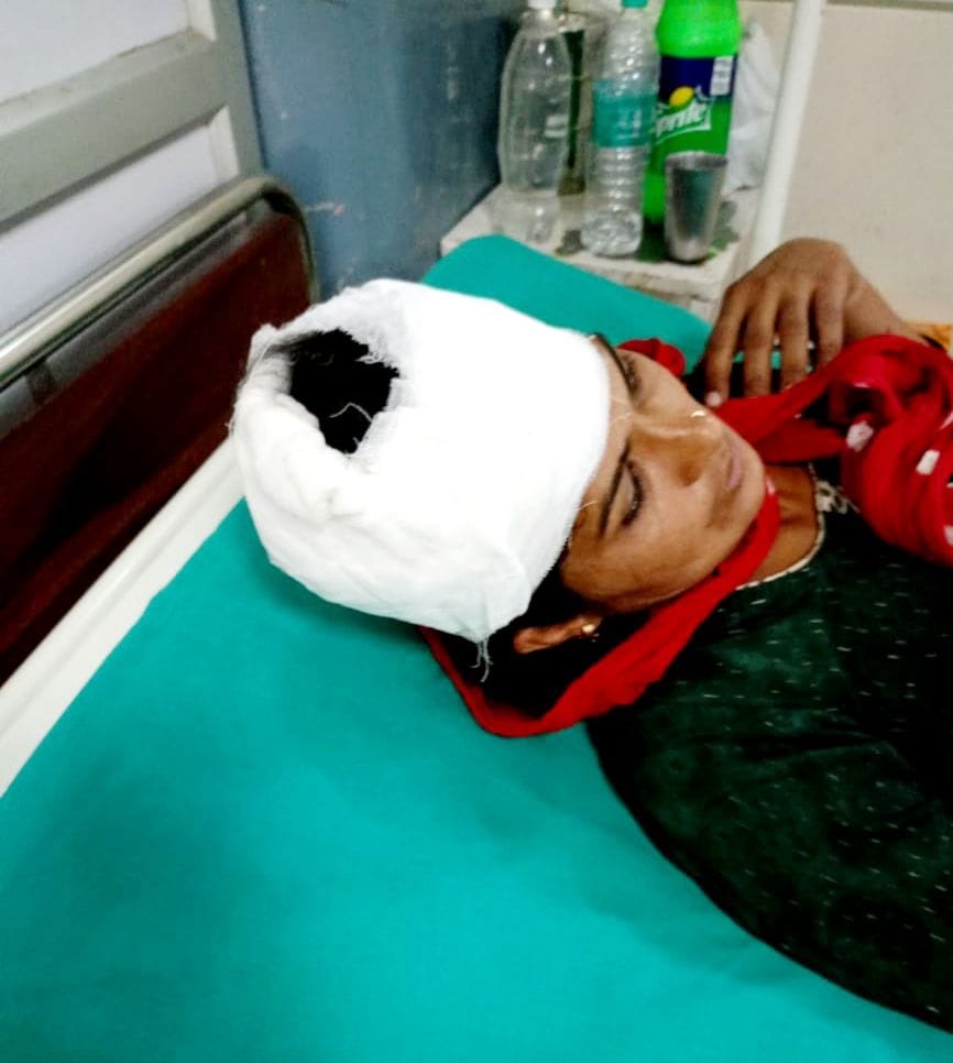 Woman and her two daughters were stabbed, beaten with rods and injured