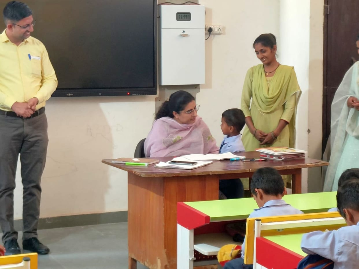 DC came to see the school which was improved by the villagers with hard work