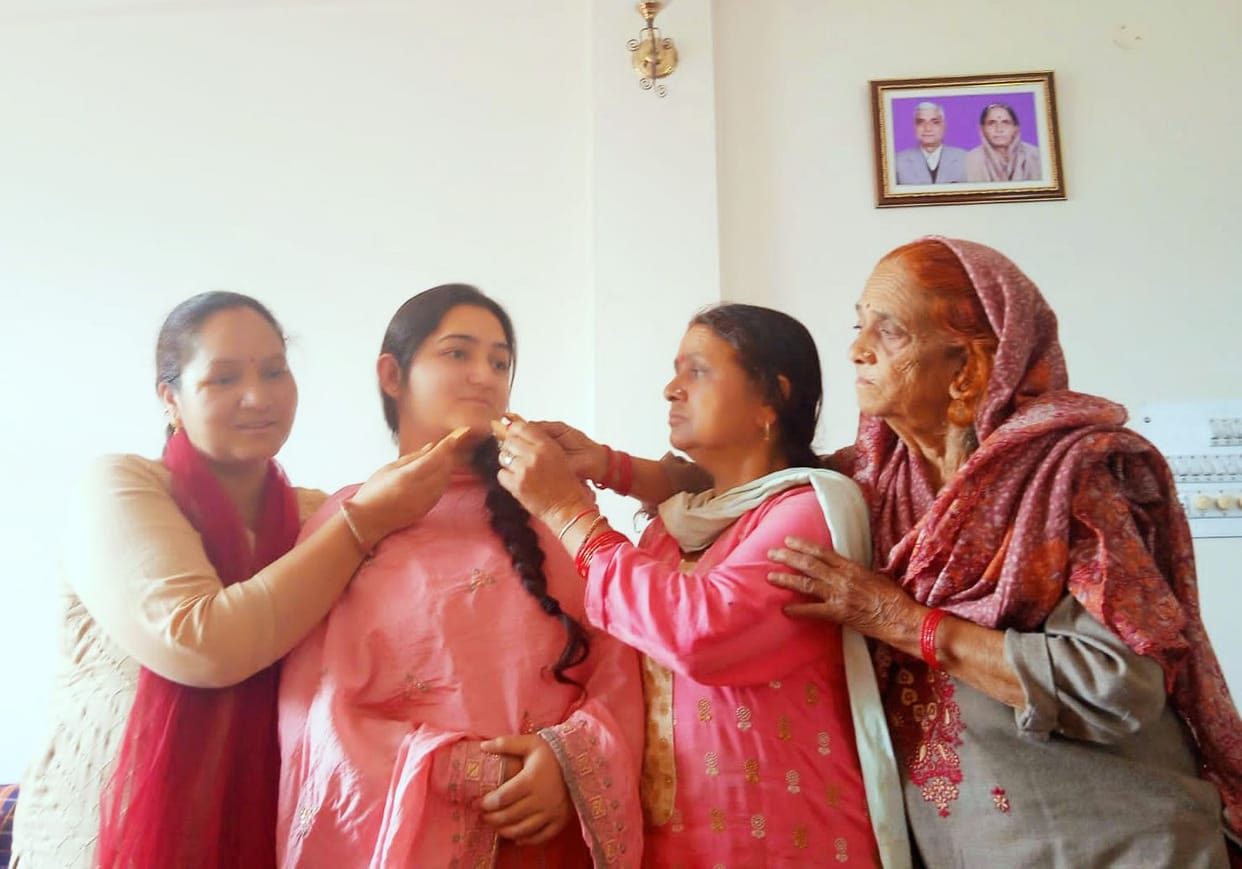 With 97.41 percent marks
Meenakshi topped the district