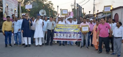 Torch procession taken out for restoration of old pension