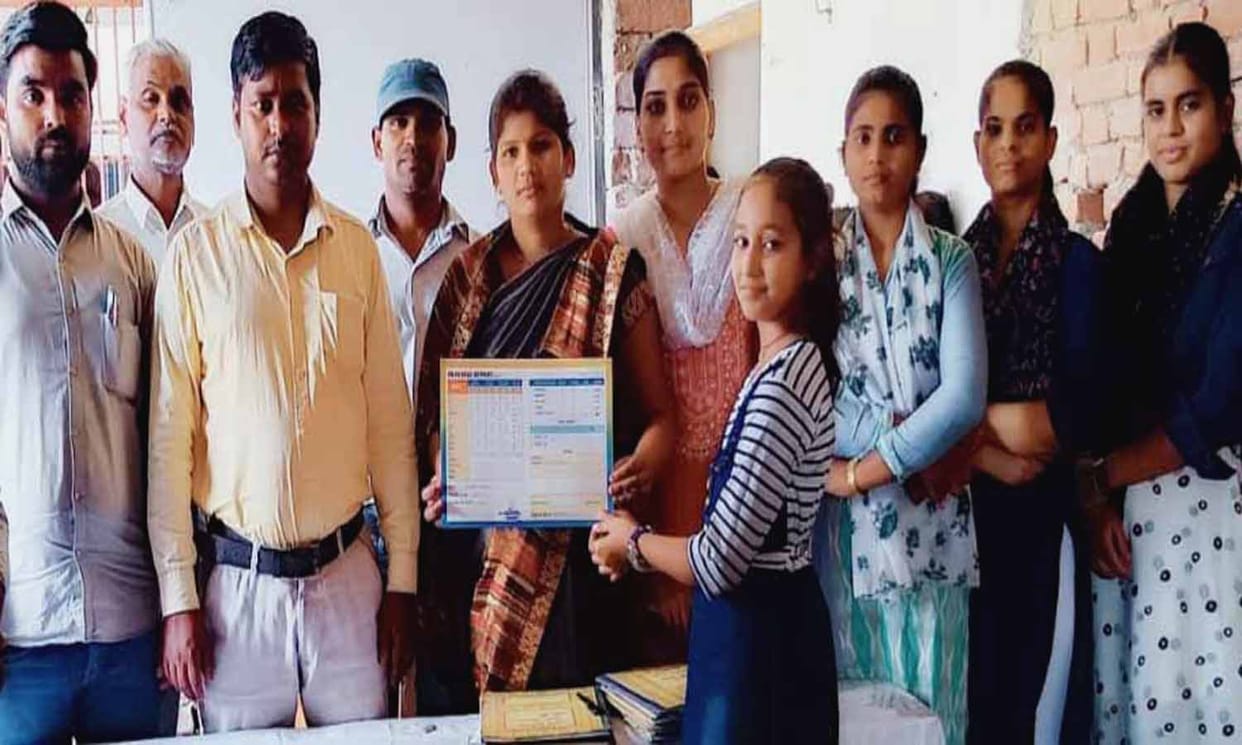 Report cards distributed, meritorious honored