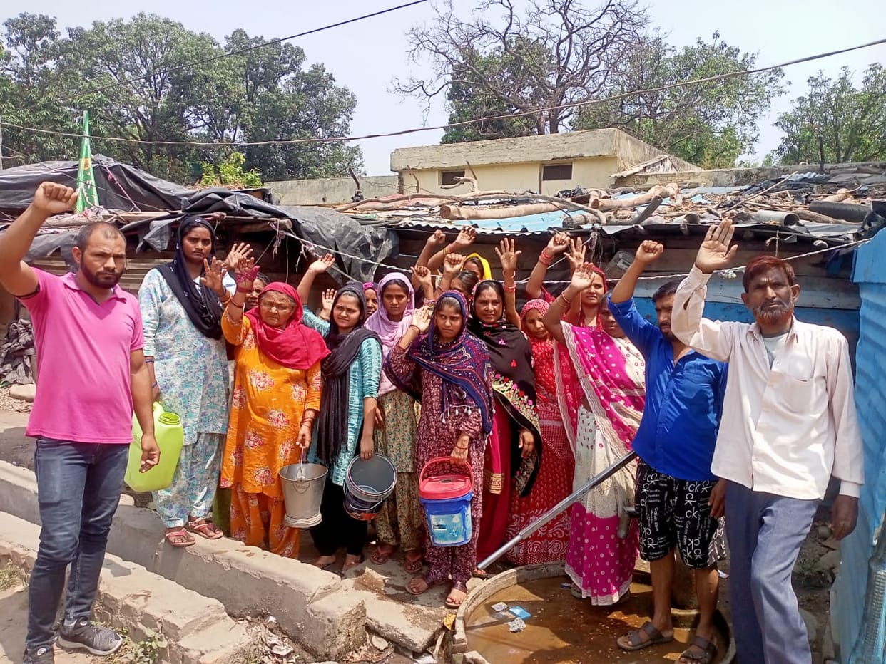 Demonstration with empty utensils for drinking water
