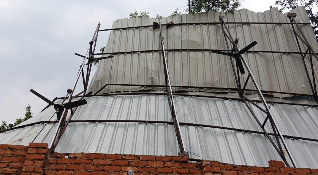 Tinshed blown away by storm