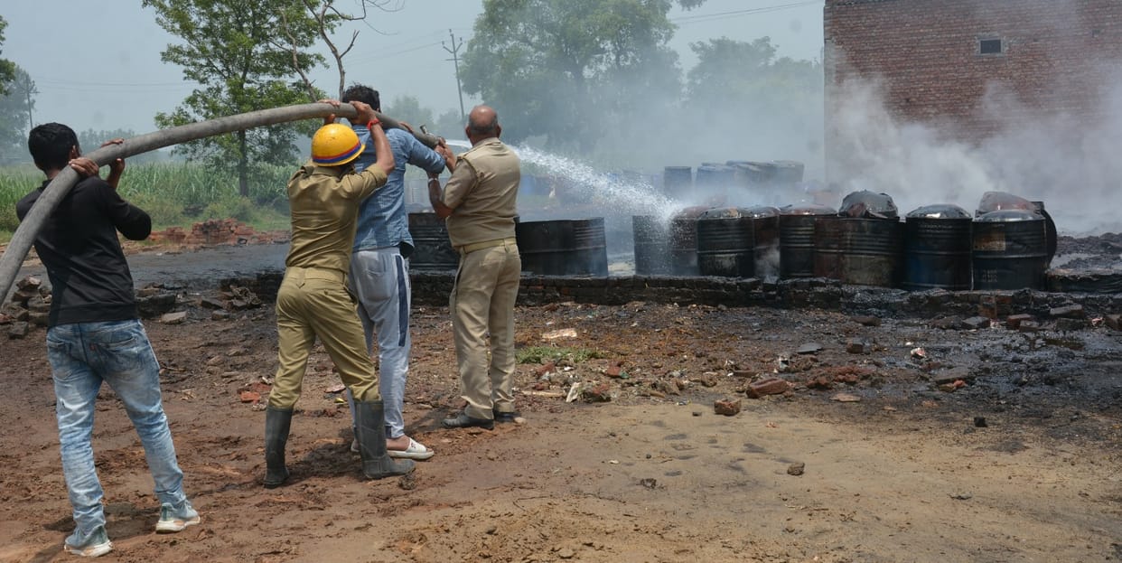 West Mobil Oil warehouse fire, four firemen scorched