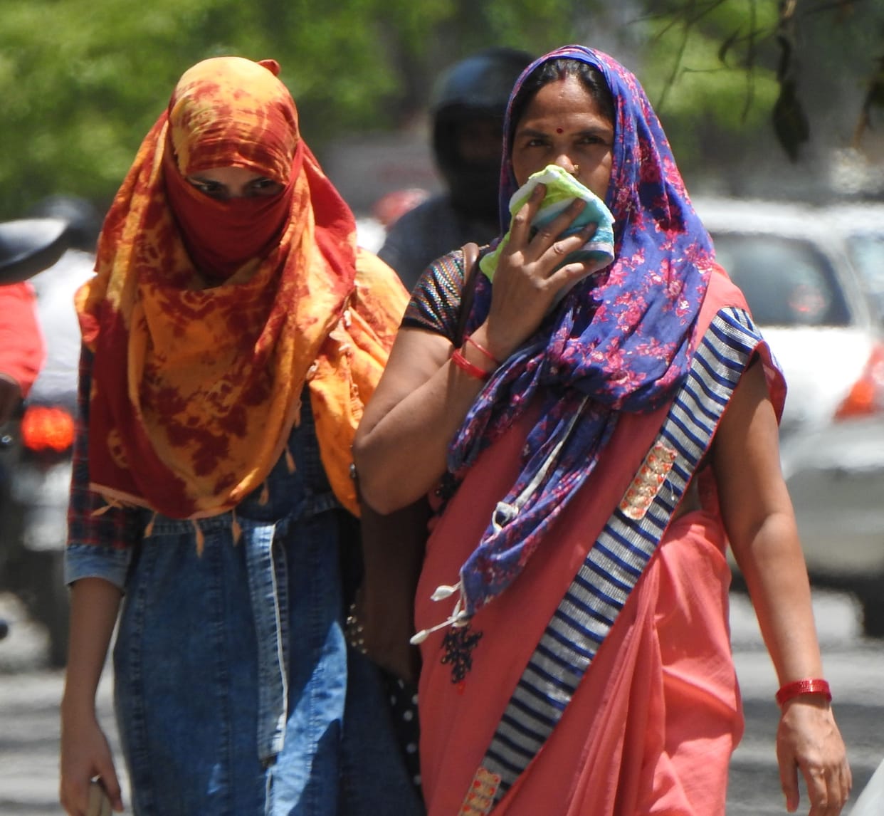 Fan spewing fire, people upset due to hot winds