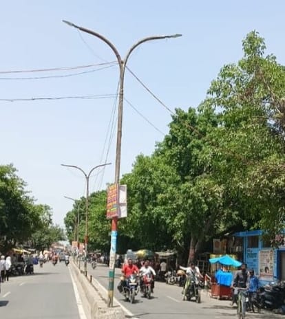 Lights removed from pillars for construction of railway overbridge