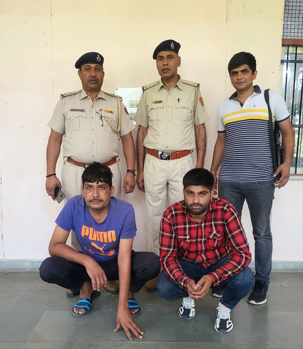 Two youths arrested for posting status with weapons on social media