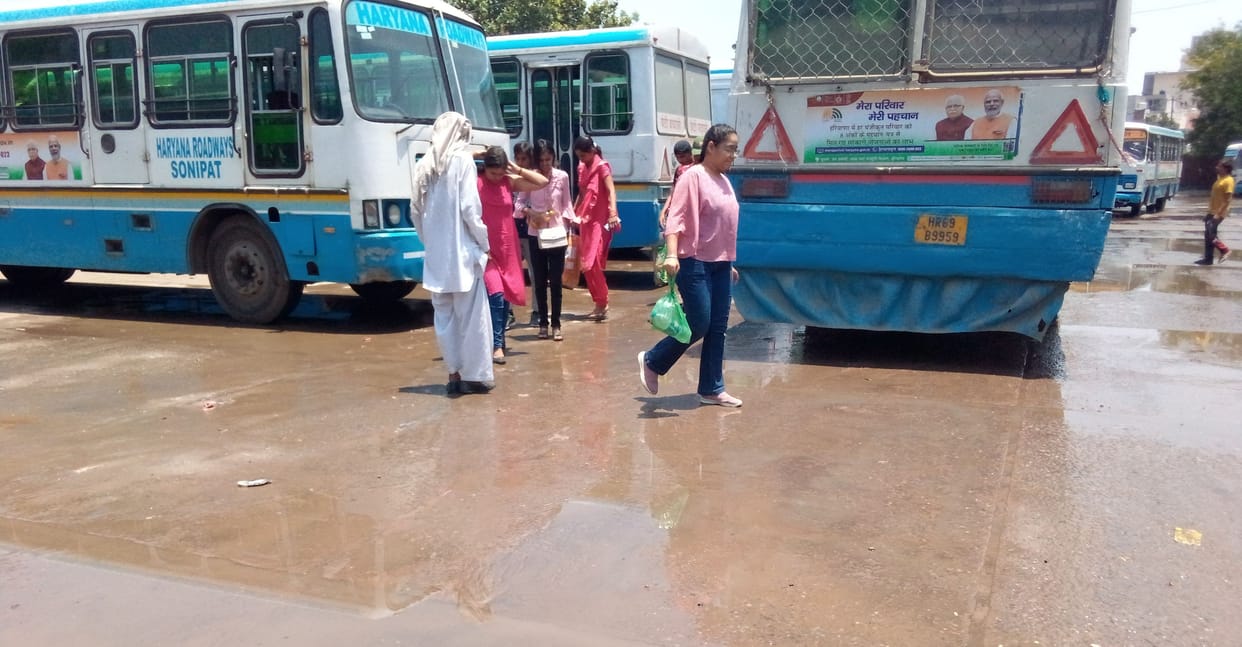 Water line connecting sewer line broken, water filled in bus stand