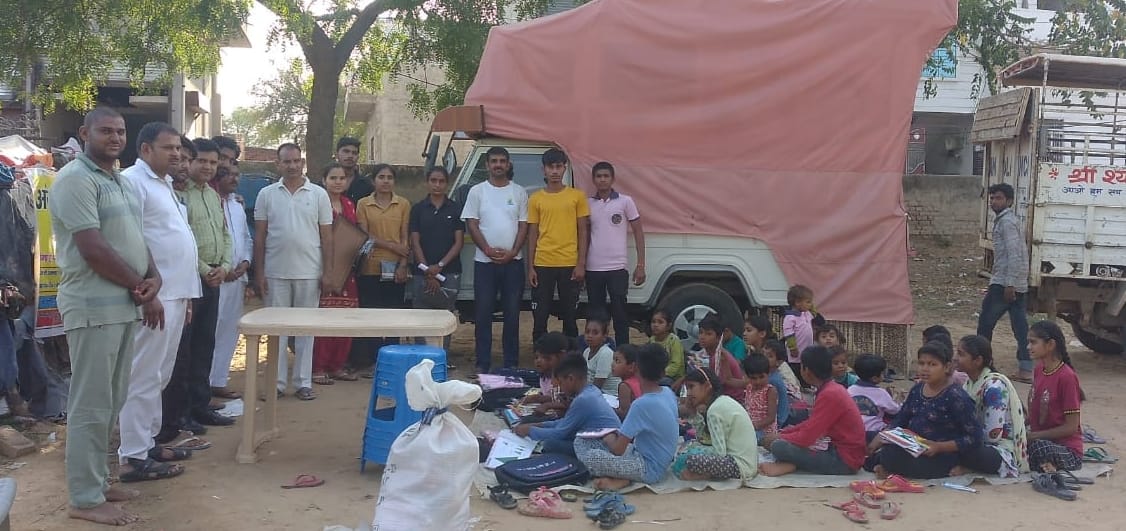 Text material was distributed in slum schools in Satnali