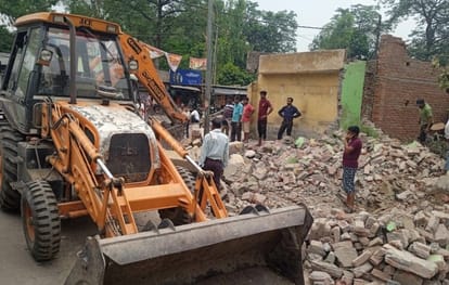 Three shops built on the drain were demolished