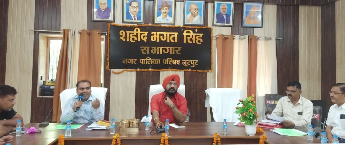 Churning on dealing with water logging in municipal meeting