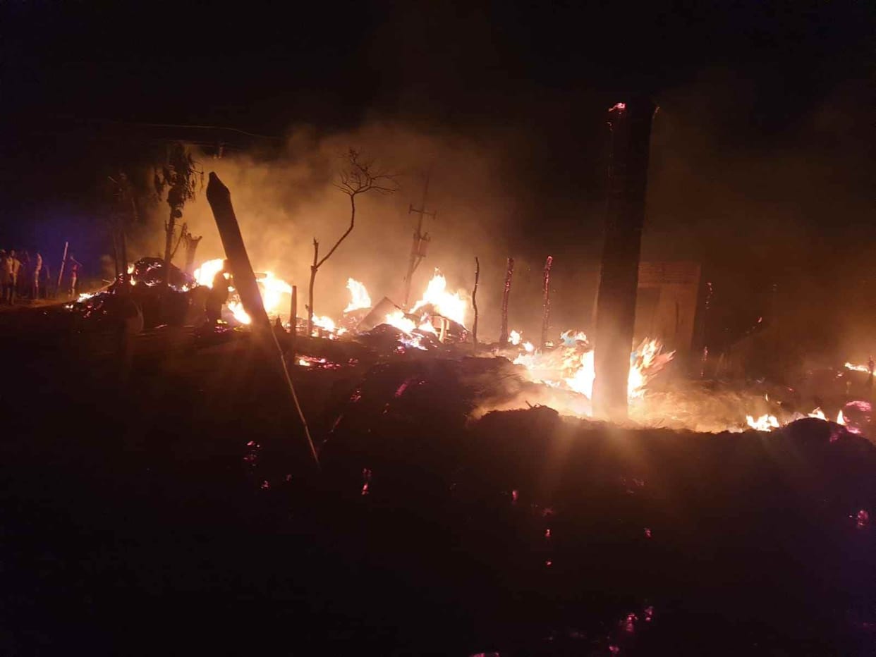 12 huts burnt