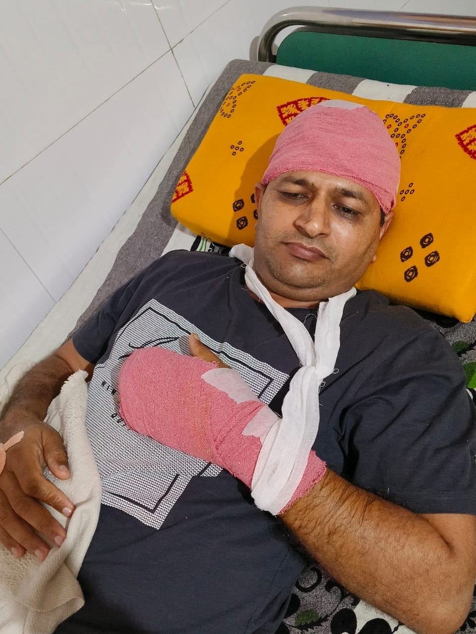 An iron rod hit the SDM of Siwani on his head