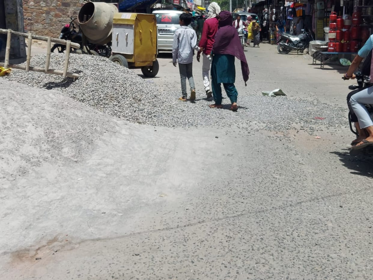 Scattered construction material in the market invites accidents