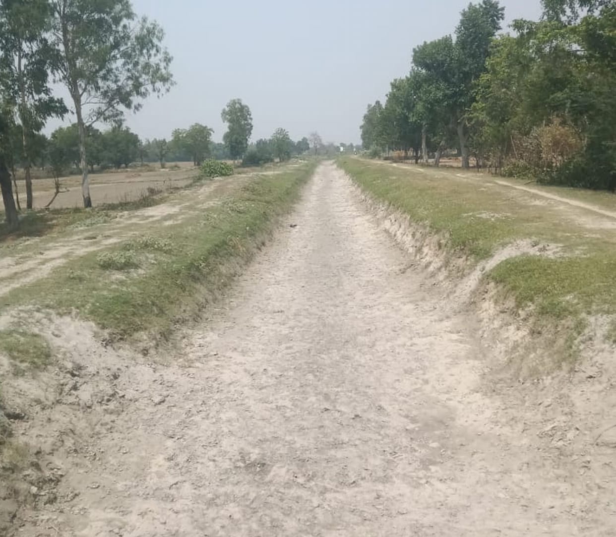 Farmers waiting for water to come in the canals