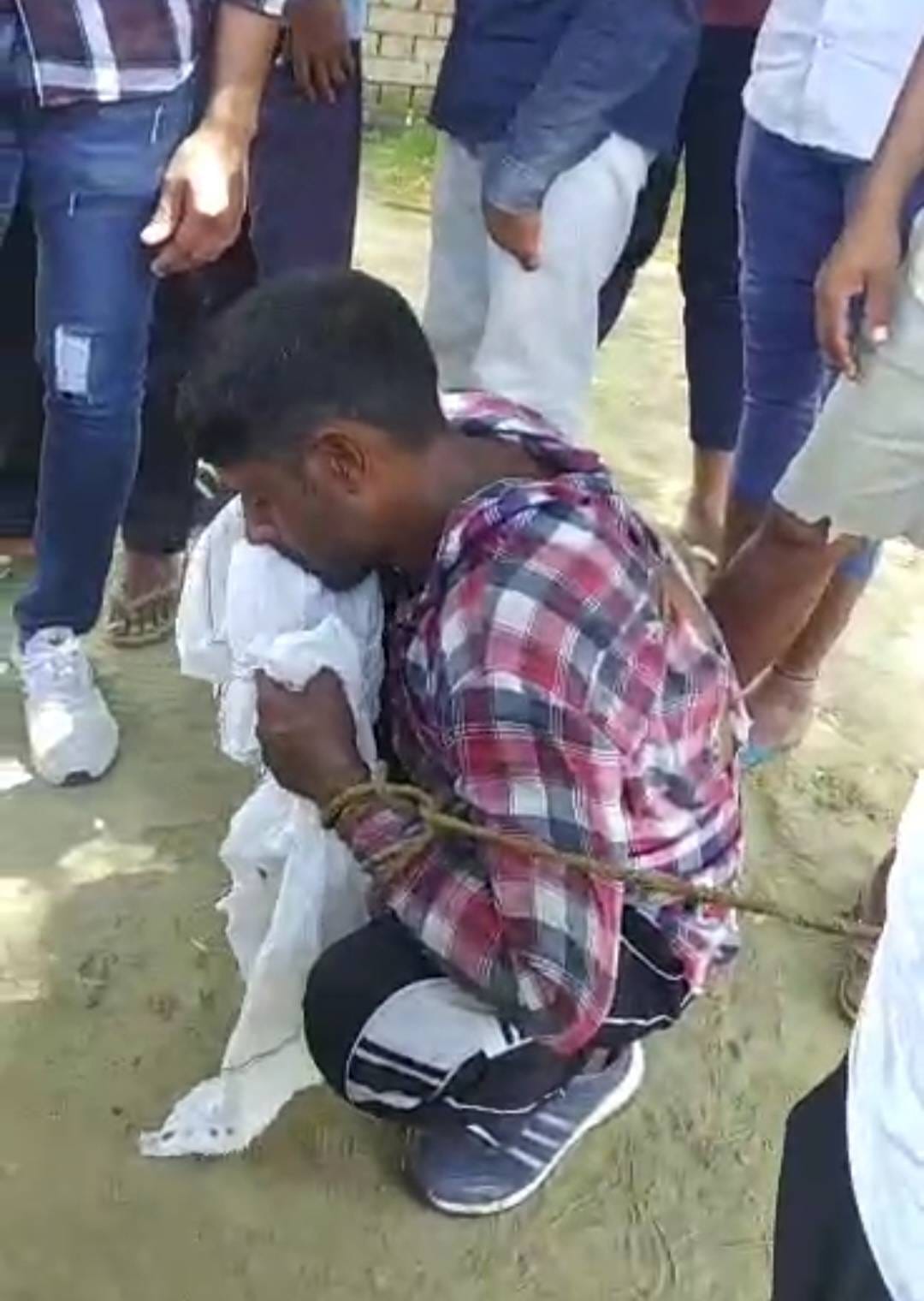 Youth caught trying to steal in Anganwadi center tied his hand and beaten with slippers