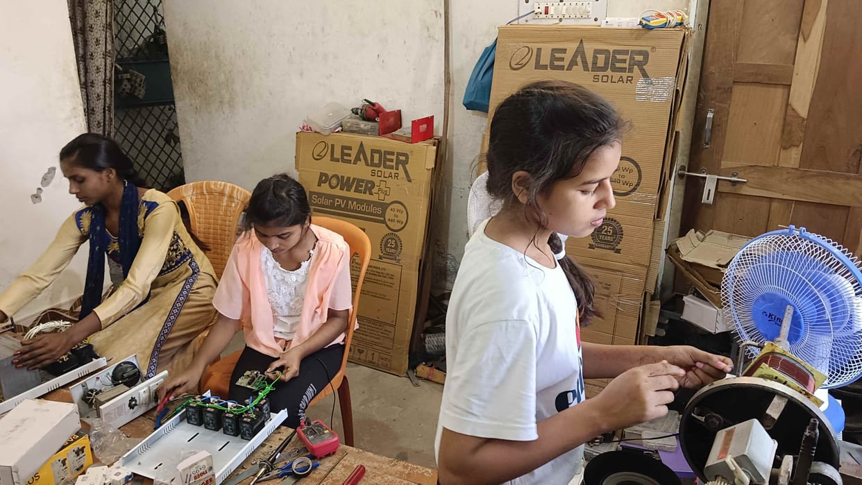 3 daughters work in her electric shop