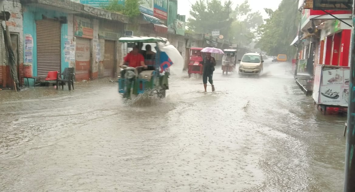 Roads submerged due to rain, water filled in shops