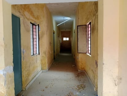 Locked in the night shelter of the district hospital, where do the guards spend the night