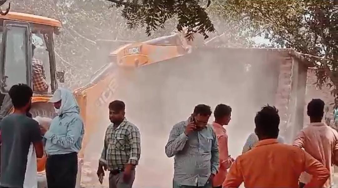 GDA bulldozer started running on encroachment marked under Khorabar Township and Medicity Scheme