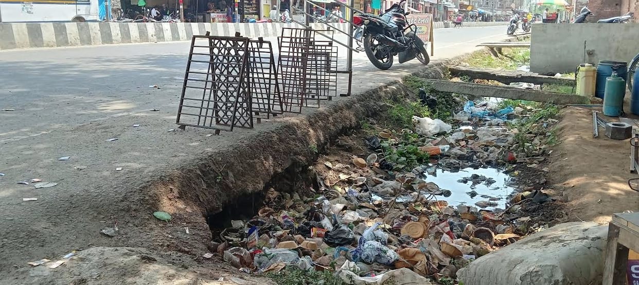 Dirt-clogged drains, people struggling with flooding