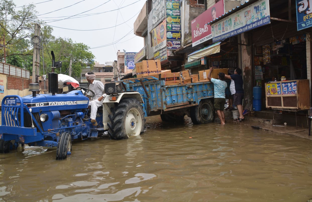 250 shops remained closed due to waterlogging, traders engaged in extracting goods