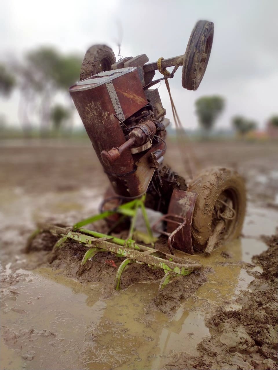 Farmer's death by being buried under the tractor