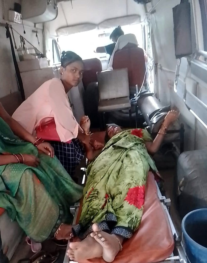 Deteriorated condition of woman sitting on dharna with five-year-old child