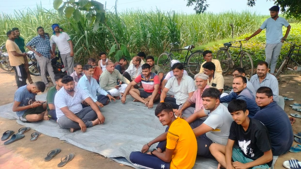 Villagers sitting on dharna at garbage disposal plant