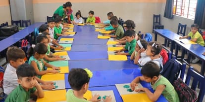 The school was decorated with green balloons, kites